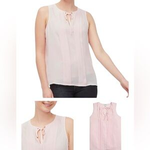 Chic White Sleeveless Blouse with Tie Neck